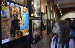 Открытие выставки фотокорреспондента МИА "Россия сегодня" Андрея Стенина